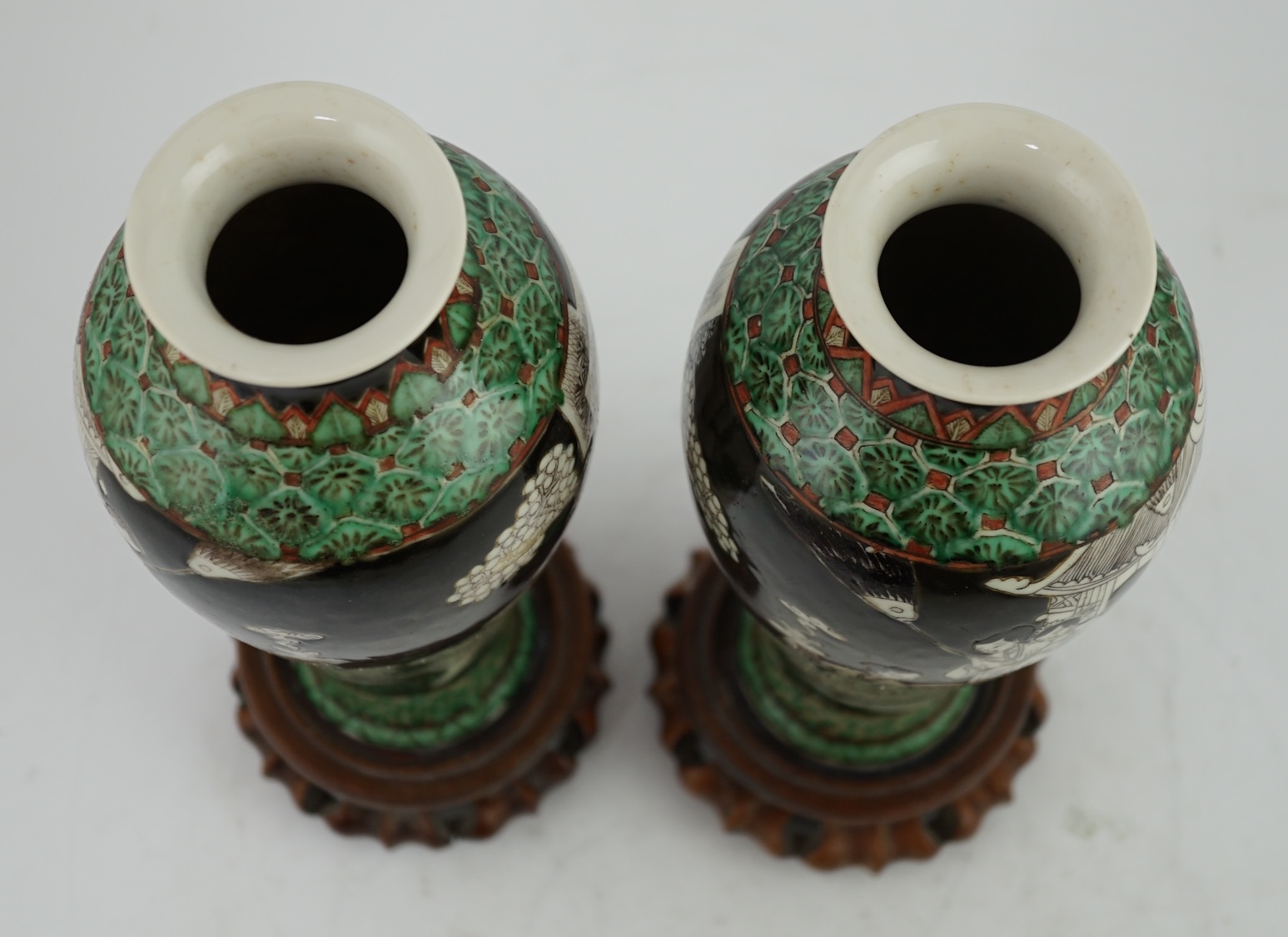 A pair of Chinese black ground enamelled porcelain baluster vases, late 19th century